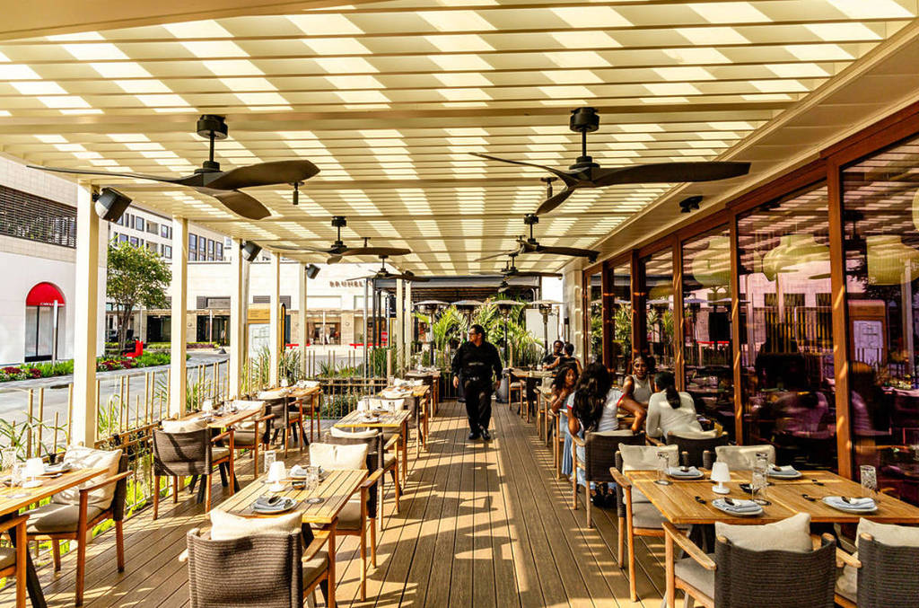 Image shows the interior of Azumi restaurant in Houston. 