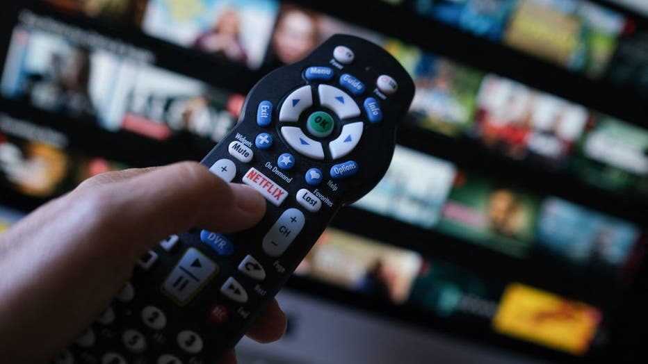 In this illustration photo taken on July 19, 2022, the Netflix logo is seen on a TV remote in Los Angeles. (Photo by Chris DELMAS / AFP) (Photo by CHRIS DELMAS/AFP via Getty Images)