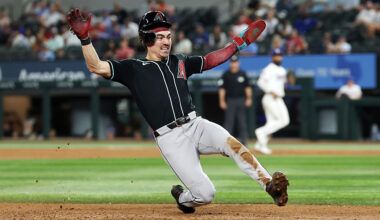 ARLINGTON, TEXAS - MAY 13: Corbin Carroll #7 of the Arizona Diamondbacks slides into third base during a game against the Texas Rangers at Globe Life Field on May 13, 2026 in Arlington, Texas. (Photo by Stacy Revere/Getty Images)