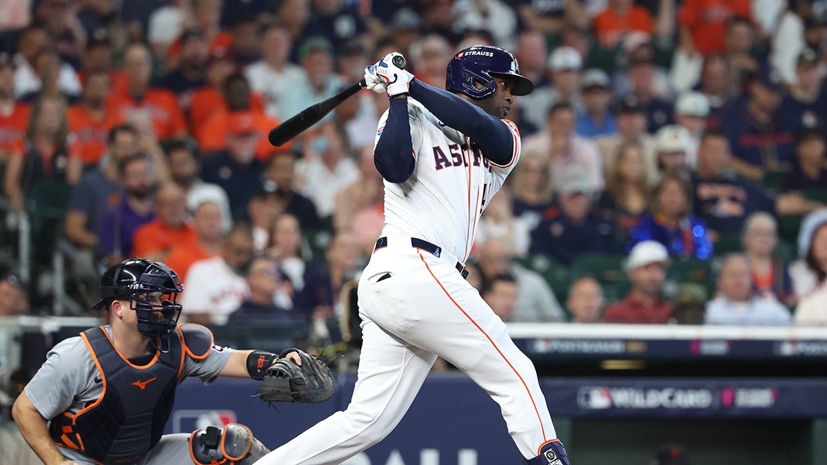 Houston Astros outfielder Yordan Alvarez hitting a single at Minute Maid Park
