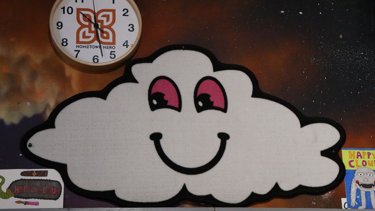 Small patch of a white cloud with red eyes and a smile. (Spectrum News 1/Andres Rendon)