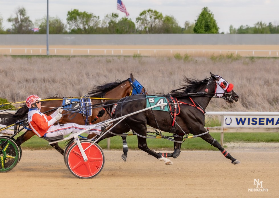  I'm Fancy Like surged late to win the Mares Open pace in 1:53.2