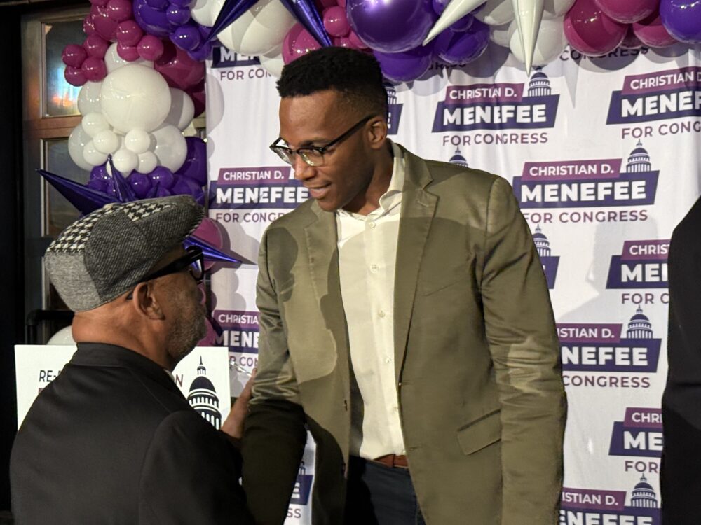 Christian Menefee celebrates at a primary election watch party on March 3, 2026.