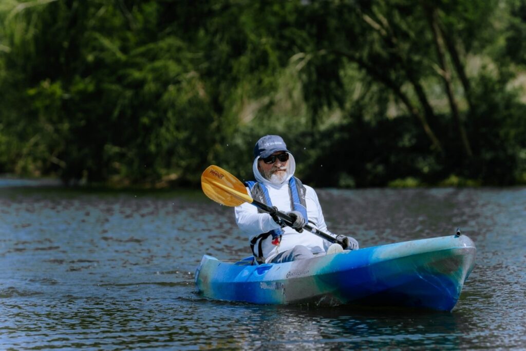 Caption: Jim Campbell participates in Race the River on the Mission Reach.