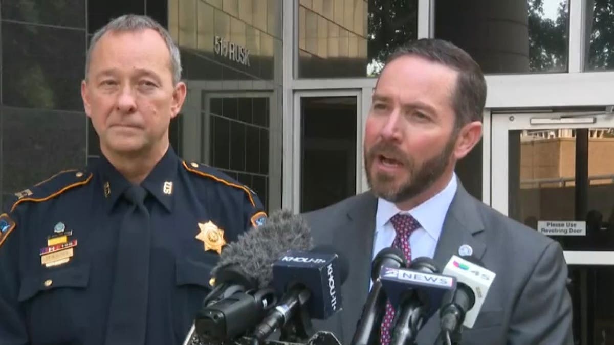 FBI Special Agent in Charge in Houston Jason Hudson briefs reporters
