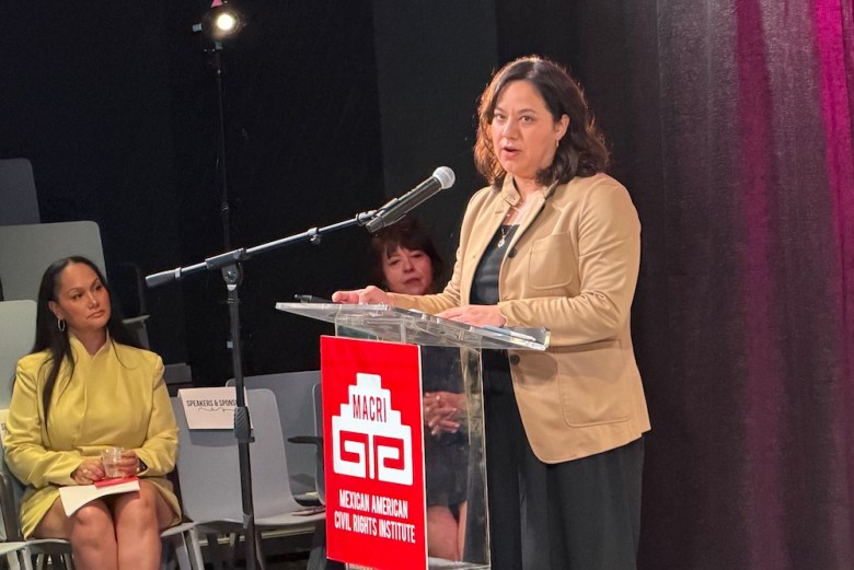 Rochelle Garza, chair of the U.S. Commission on Civil Rights and the president of the Texas Civil Rights Project, delivers the symposium's keynote speech.
