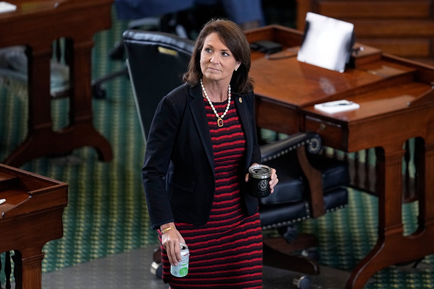 Texas state Senator Angela Paxton, wife of Ken Paxton, walked through the Senate Chamber during the impeachment trial for her husband, on Sept. 16, 2023, in Austin.