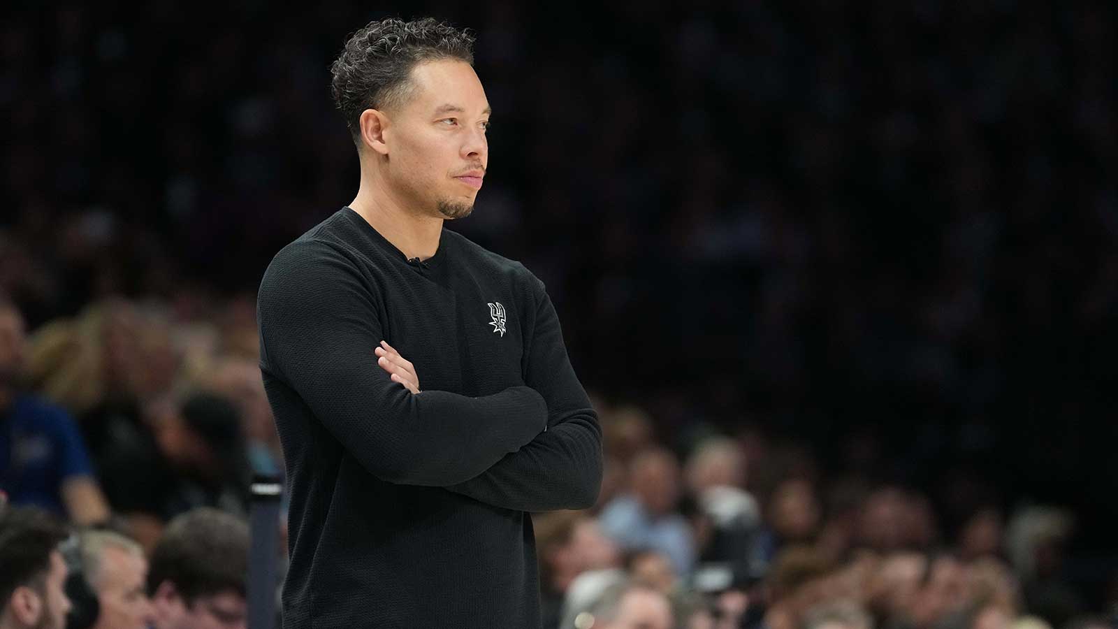 San Antonio Spurs head coach Mitch Johnson looks on against the Minnesota Timberwolves in the first half during game six of the second round of the 2026 NBA Playoffs at Target Center.