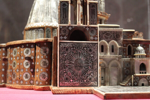 A detail photograph of a wood model of a the Church of the Holy Sepulcher.