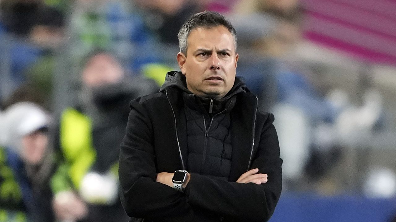 FC Dallas head coach Nico Estévez looks on from the sideline during the first half of Game 3 of a first round playoff MLS soccer match against the Seattle Sounders, Nov. 10, 2023, in Seattle. (AP Photo/Lindsey Wasson)