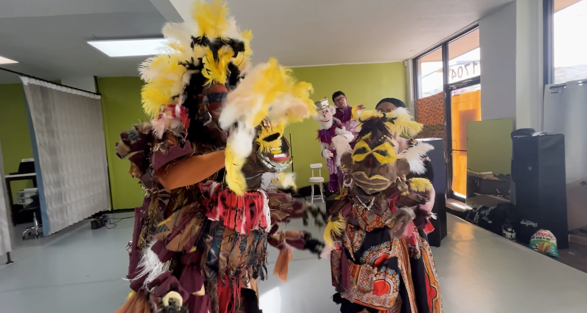 Local artist brings giant puppets and message of hope to Plaza Theatre