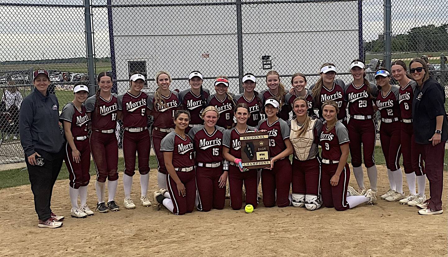 The Morris softball team poses with the plaque after winning the Class 3A Plano Regional with a 10-0 triumph over Plano.