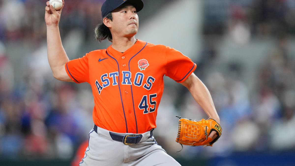 Houston Astros starting pitcher Tatsuya Imai throwing a pitch during a baseball game.