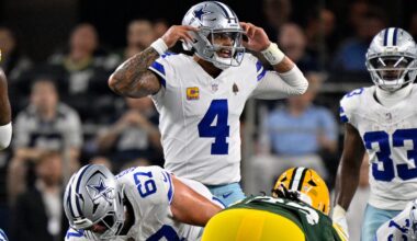 Sep 28, 2025; Arlington, Texas, USA; Dallas Cowboys quarterback Dak Prescott (4) motions to his team during the game between the Dallas Cowboys and the Green Bay Packers at AT&T Stadium.