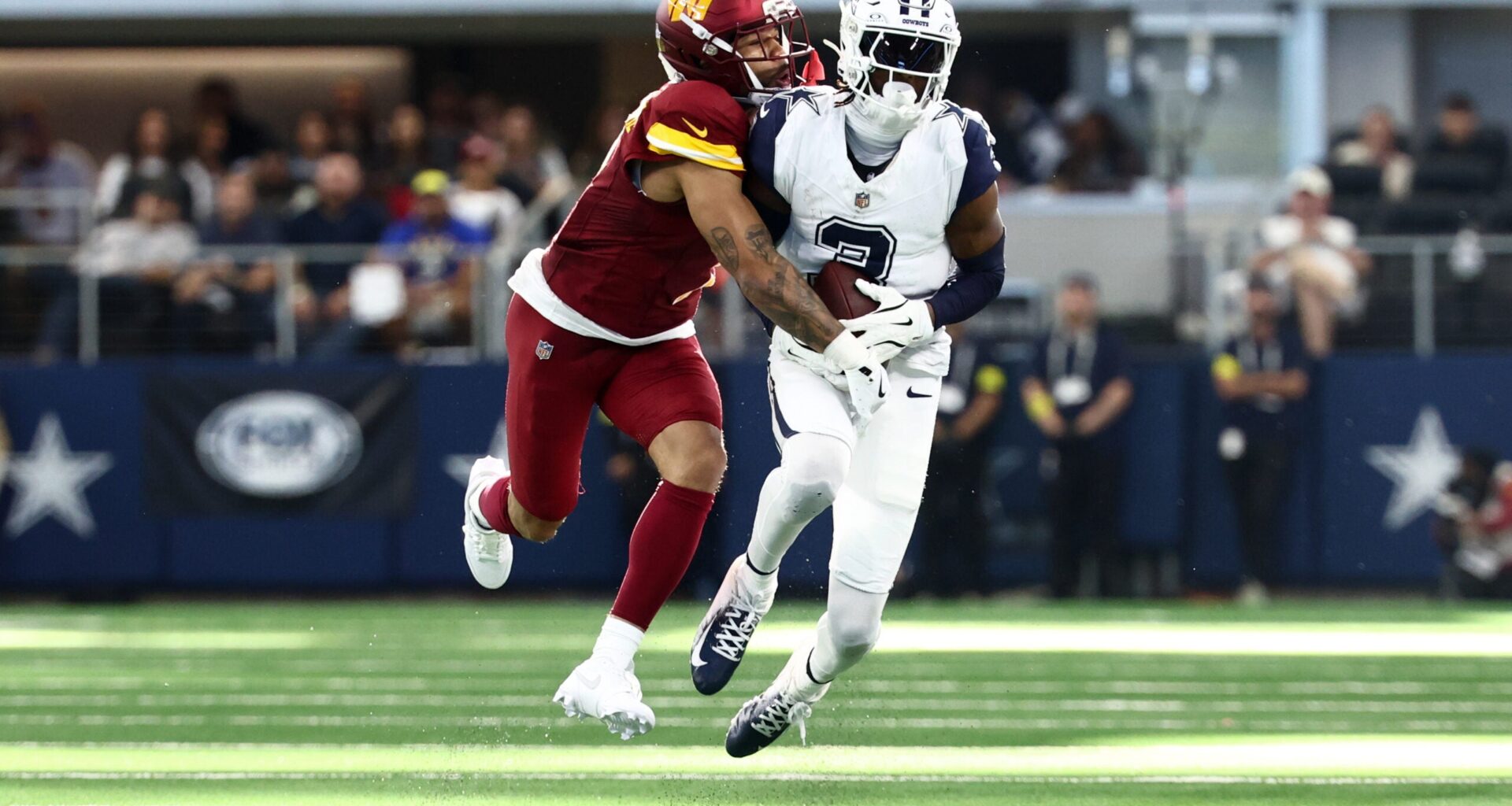 Oct 19, 2025; Arlington, Texas, USA; Dallas Cowboys wide receiver George Pickens (3) makes a reception defended by Washington Commanders cornerback Marshon Lattimore (2) during the second quarter of the game at AT&T Stadium.