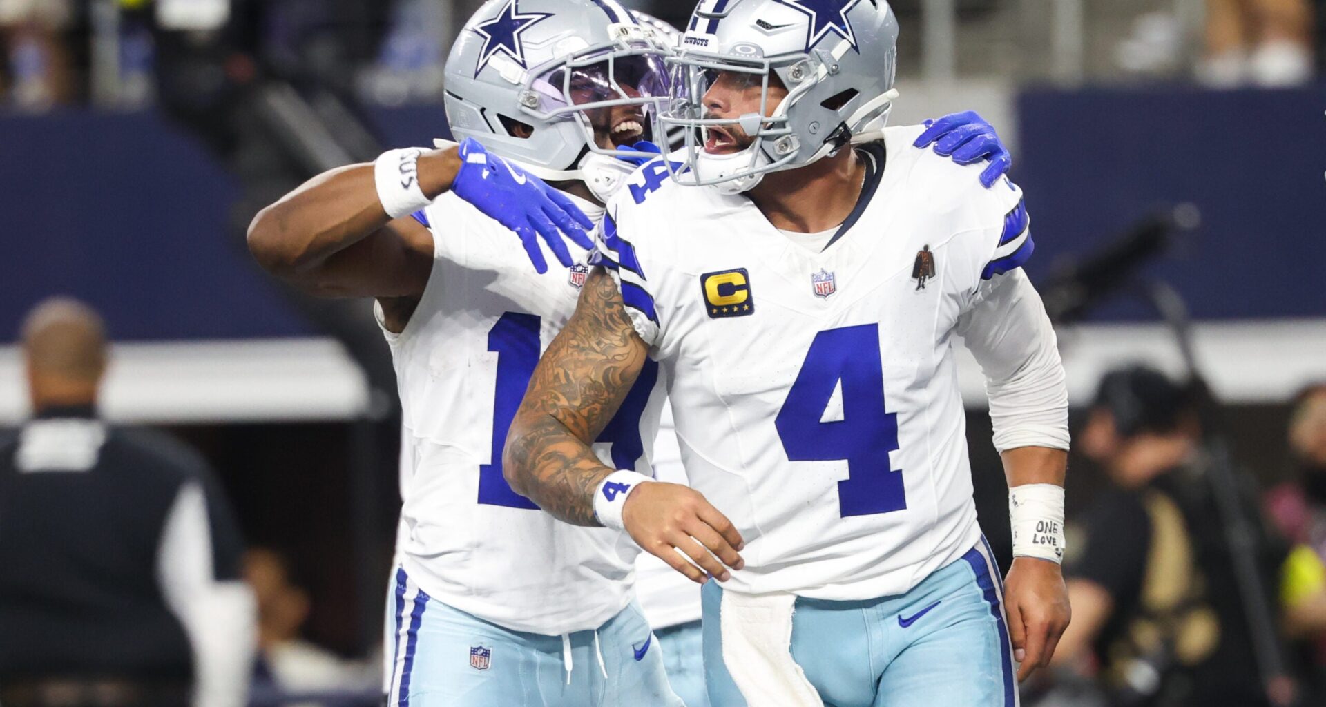 Nov 23, 2025; Arlington, Texas, USA; Dallas Cowboys quarterback Dak Prescott (4) celebrates a touchdown in the fourth quarter against the Philadelphia Eagles at AT&T Stadium.