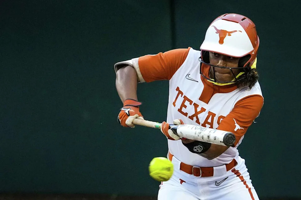 Texas Longhorns outfielder Kayden Henry (21) bats in the third inning as the Texas Longhorns take on the Oklahoma State Cowgirls at McCombs Field in Austin, April 22, 2026. (Sara Diggins/Austin American-Statesman)