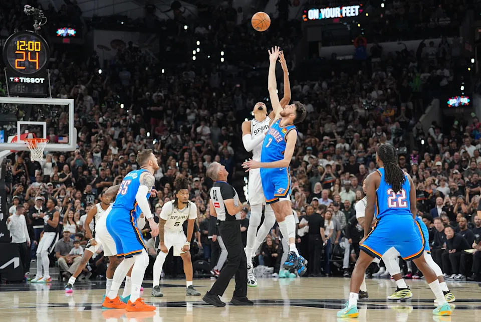 May 24, 2026; San Antonio, Texas, USA; Oklahoma City Thunder center Chet Holmgren (7) and San Antonio Spurs center Victor Wembanyama (1) tip off game four of the western conference finals for the 2026 NBA playoffs at Frost Bank Center. Mandatory Credit: Daniel Dunn-Imagn Images