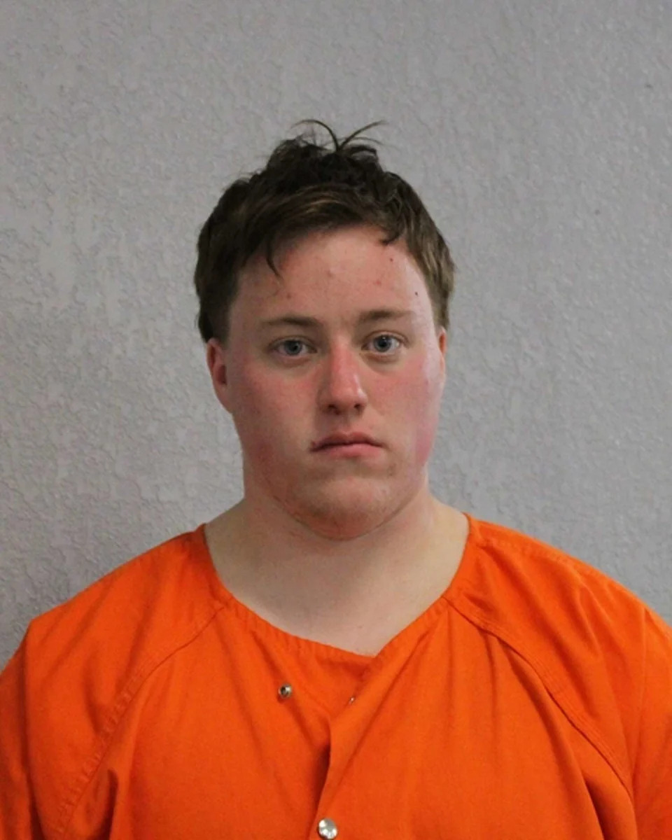 Gavin Pope, shown in a booking photo, was arrested Jan. 28 during a protest outside the South Texas Family Residential Center in Dilley, 70 miles southwest of San Antonio. He was charged with interference with public duties, a misdemeanor. (Frio County Sheriff's Office)