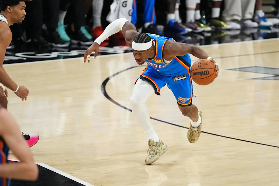 May 24, 2026; San Antonio, Texas, USA; Oklahoma City Thunder guard Shai Gilgeous-Alexander (2) drives the ball in the first quarter against the San Antonio Spurs during game four of the western conference finals for the 2026 NBA playoffs at Frost Bank Center. Mandatory Credit: Scott Wachter-Imagn Images
