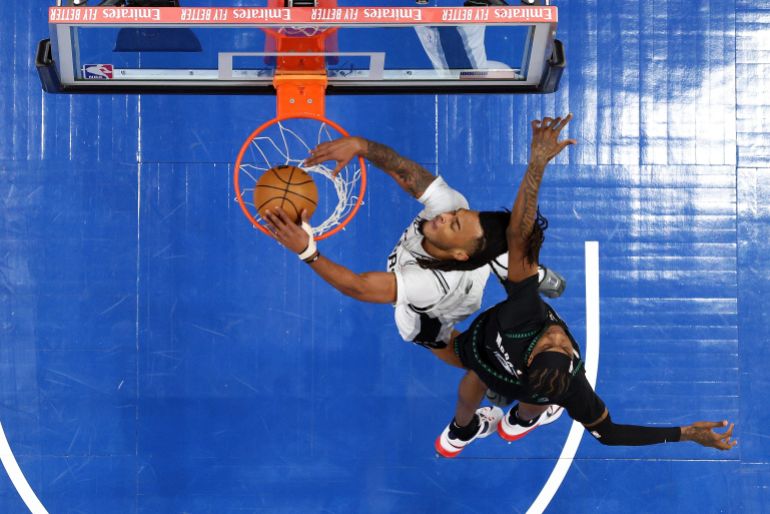 MINNEAPOLIS, MINNESOTA - MAY 15: Stephon Castle #5 of the San Antonio Spurs dunks the ball against Jaden McDaniels #3 of the Minnesota Timberwolves in the first quarter in Game Six of the Second Round of the NBA Western Conference Playoffs at Target Center on May 15, 2026 in Minneapolis, Minnesota. NOTE TO USER: User expressly acknowledges and agrees that, by downloading and or using this photograph, User is consenting to the terms and conditions of the Getty Images License Agreement. David Berding/Getty Images/AFP (Photo by David Berding / GETTY IMAGES NORTH AMERICA / Getty Images via AFP)