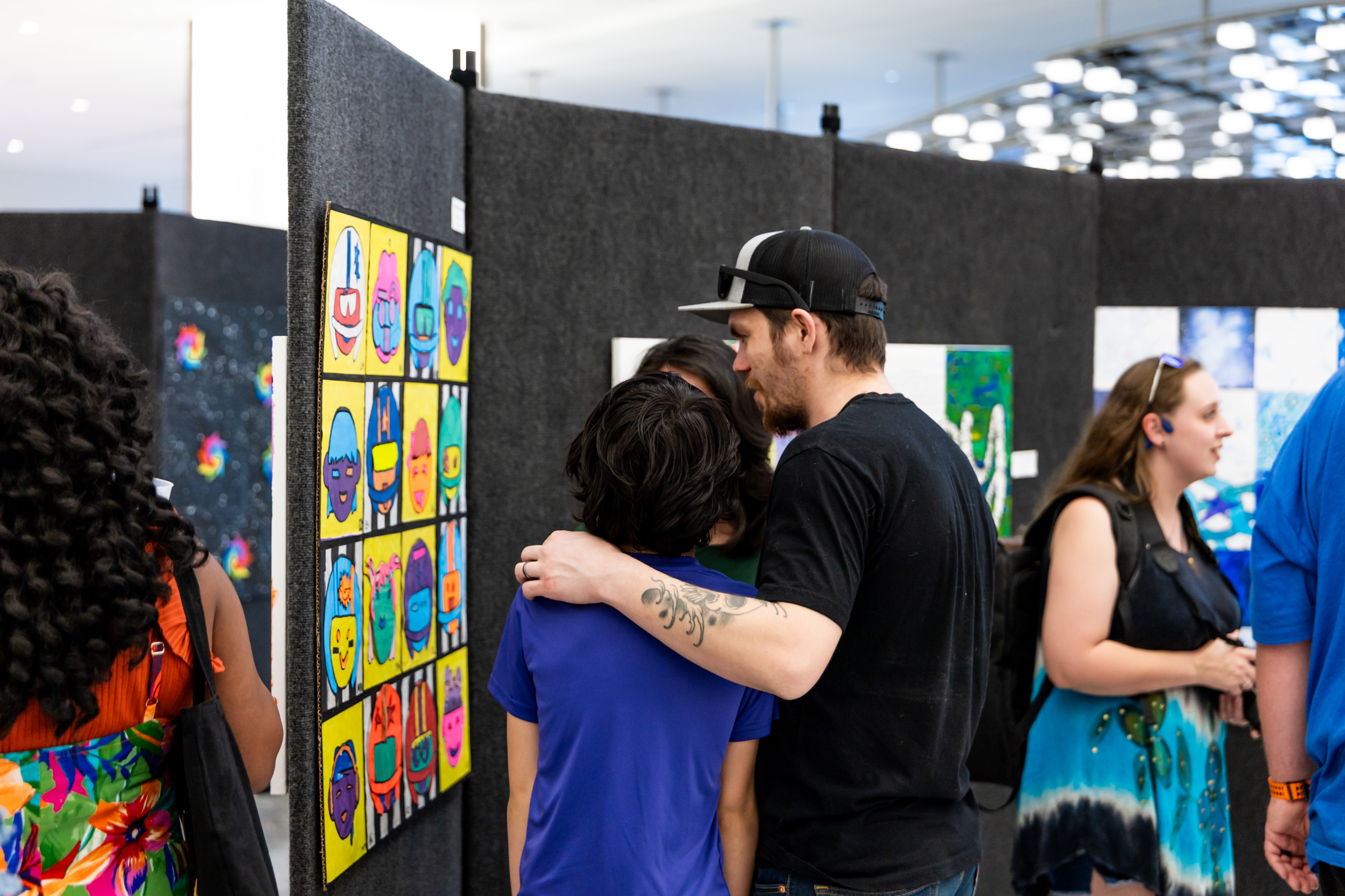 Family looking at artwork