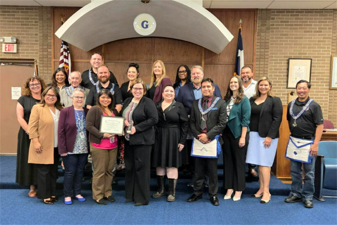Group of library workers receiving an award