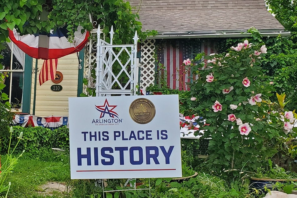 Sign in front of home that reads 