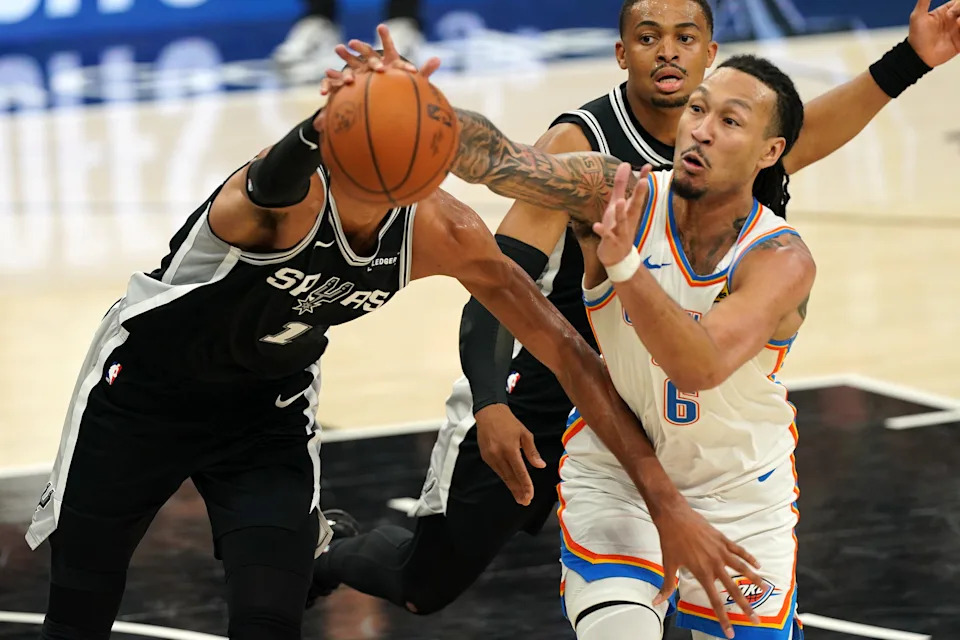 May 28, 2026; San Antonio, Texas, USA; San Antonio Spurs forward Victor Wembanyama (1) and Oklahoma City Thunder forward Jaylin Williams (6) attempt to get a loose ball in the second half during game six of the western conference finals for the 2026 NBA playoffs at Frost Bank Center. Mandatory Credit: Dustin Safranek-Imagn Images