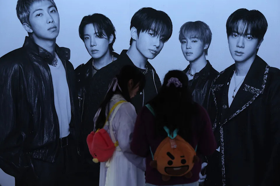 Fans of K-pop boy band BTS share a moment ahead of the BTS World Tour 'Arirang' at Goyang stadium on April 09, 2026.