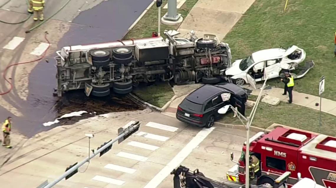 Firefighters work to contain crude oil leak after tanker crash in West Plano