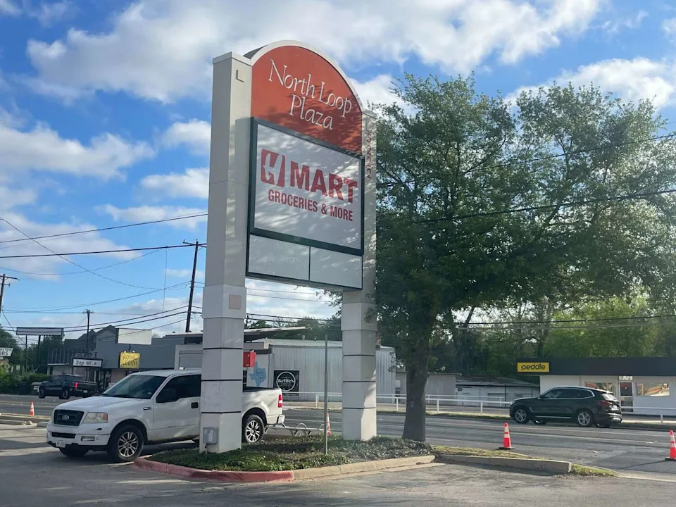 Construction crews are advancing work on Austin's second H Mart store, with signage now installed on the building and in the shopping complex's directory. (Kelsey Thompson/MySA)