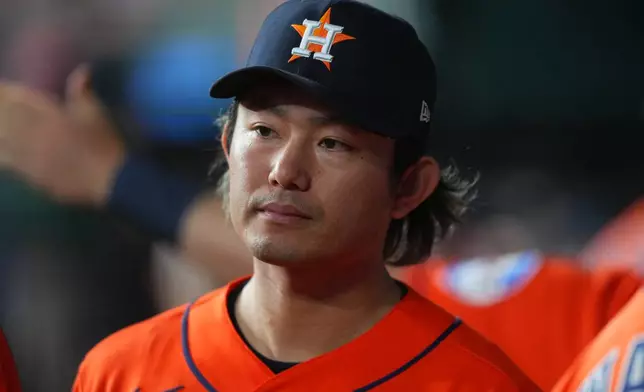 Houston Astros starting pitcher Tatsuya Imai walks in the dugout after pitching to the Texas Rangers during the fifth inning of a baseball game Monday, May 25, 2026, in Arlington, Texas. (AP Photo/Julio Cortez)