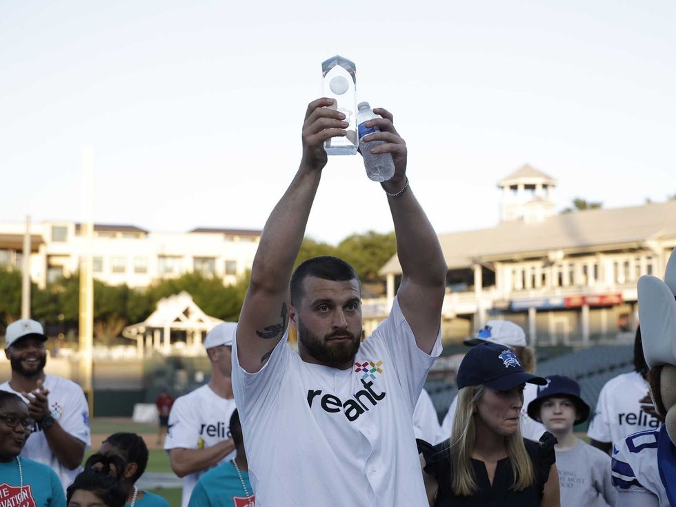 Dallas Cowboys tight end Jake Ferguson celebrating his win at the 2026 Reliant Home Run Derby