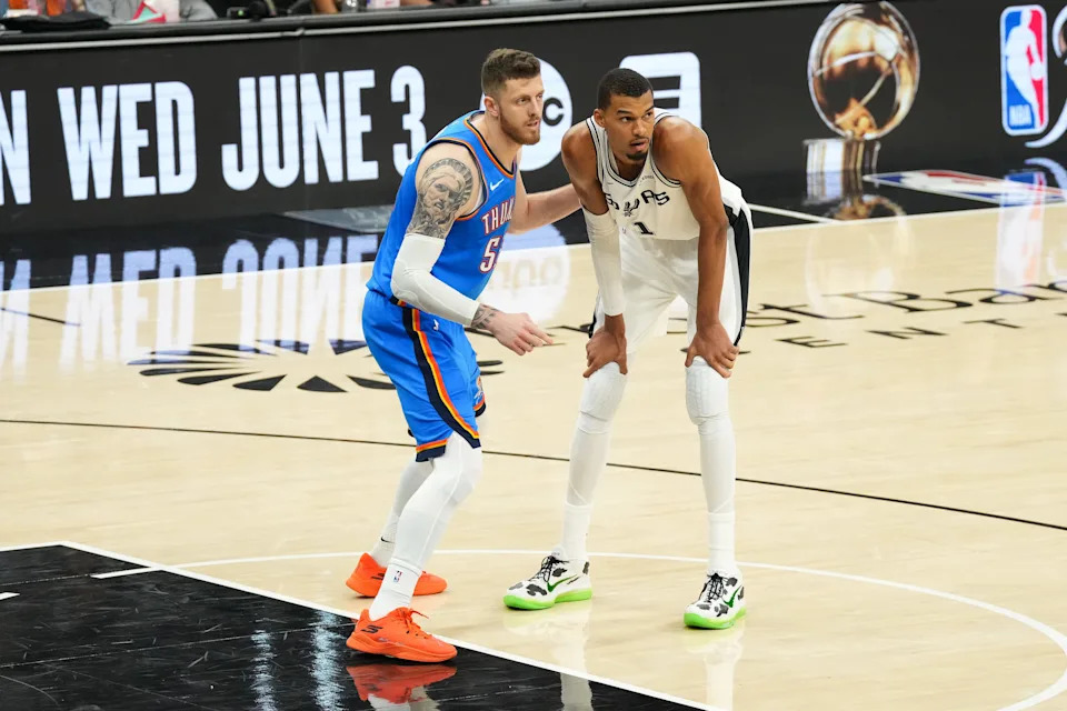 May 24, 2026; San Antonio, Texas, USA; Oklahoma City Thunder center Isaiah Hartenstein (55) and San Antonio Spurs center Victor Wembanyama (1) look on during the fourth quarter during game four of the western conference finals for the 2026 NBA playoffs at Frost Bank Center. Mandatory Credit: Scott Wachter-Imagn Images