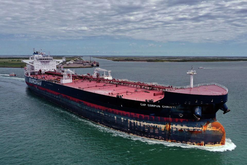 In this aerial drone view from a drone, a petroleum tanker ship passes through the Aransas Channel to the Gulf of Mexico after departingt the Port of Corpus Christi on May 26, 2020 in Port Aransas, Texas. Curde oil exports from the Port of Corpus Christi have surged amid the war in Iran. (Tom Pennington/Getty Images)