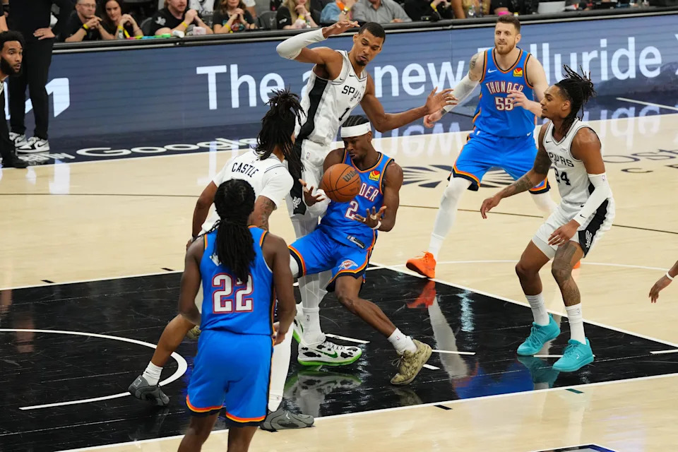 May 24, 2026; San Antonio, Texas, USA; Oklahoma City Thunder guard Shai Gilgeous-Alexander (2) grabs a loose ball int he first quarter against the San Antonio Spurs during game four of the western conference finals for the 2026 NBA playoffs at Frost Bank Center. Mandatory Credit: Scott Wachter-Imagn Images