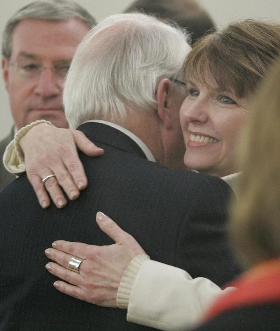 After the verdict was read, Allen Walker, right, daughter of Laura Lee Crane, thanks prosecutors Joe Shannon, center, and Greg Miller, left, in a Fort Worth courtroom on Nov. 17, 2005.