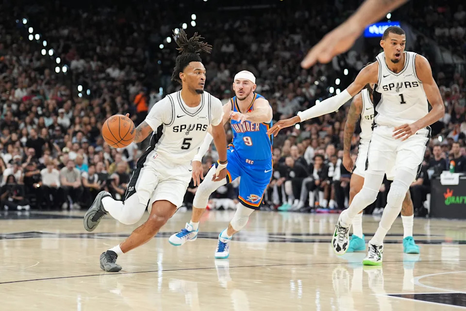 May 24, 2026; San Antonio, Texas, USA; San Antonio Spurs guard Stephon Castle (5) drives the ball in the first quarter against the Oklahoma City Thunder during game four of the western conference finals for the 2026 NBA playoffs at Frost Bank Center. Mandatory Credit: Daniel Dunn-Imagn Images
