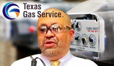 A photographic illustration showing George Zavala in a white shirt with a yellow tie holding a cane in front of a magnified gas company meter and the logo of Texas Gas superimposed on the left top corner.