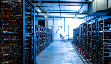 A picture of rows of computers in a datacenter.