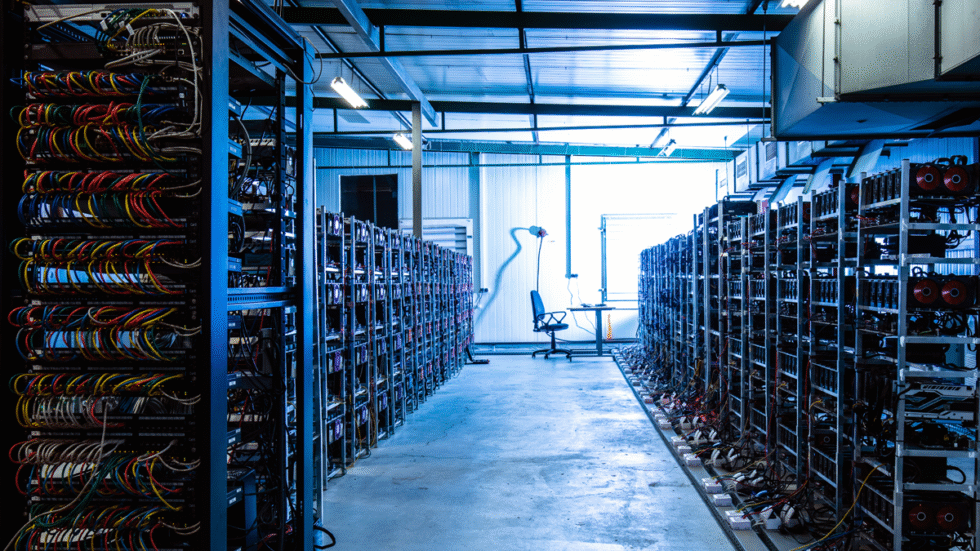 A picture of rows of computers in a datacenter.