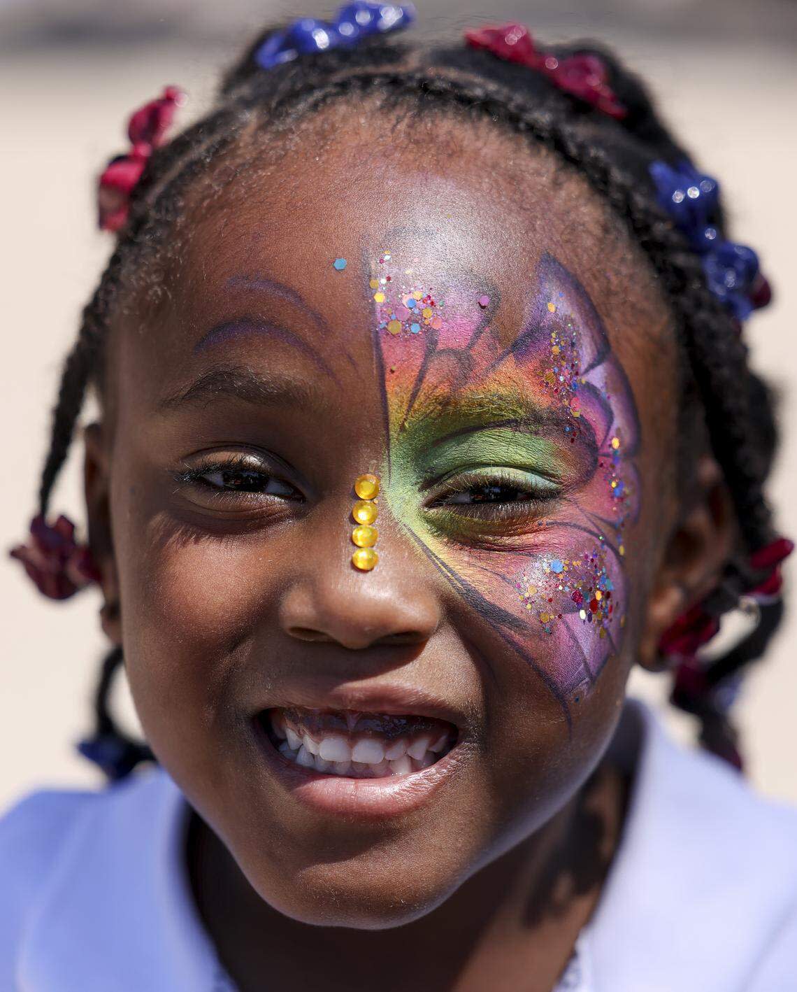 Abigail Shoalts, 5, has a butterfly painted on her face during Mayfest at Trinity Park on Saturday, May 2, 2026, in Fort Worth.