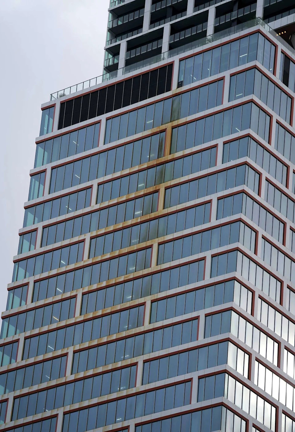 A stain is seen on The Waterline, a supertall skyscraper under construction in Austin on Monday, May 18, 2026. (Jay Janner/Austin American-Statesman)