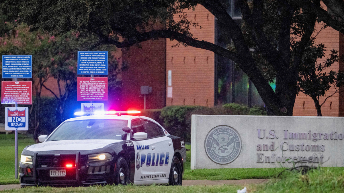 Law enforcement personnel responding at Immigration and Customs Enforcement field office in Dallas Texas