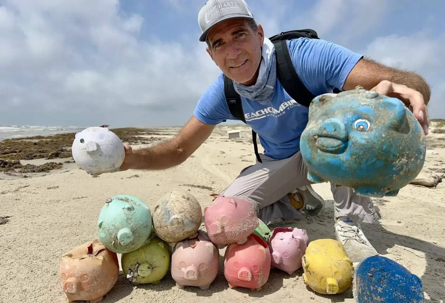 Jace Tunnell poses with some of the "sea pigs" he's found.