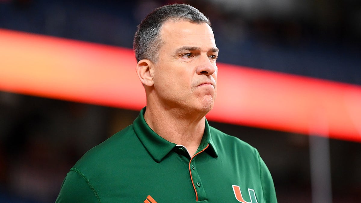Miami Hurricanes head coach Mario Cristobal looking on at JMA Wireless Dome