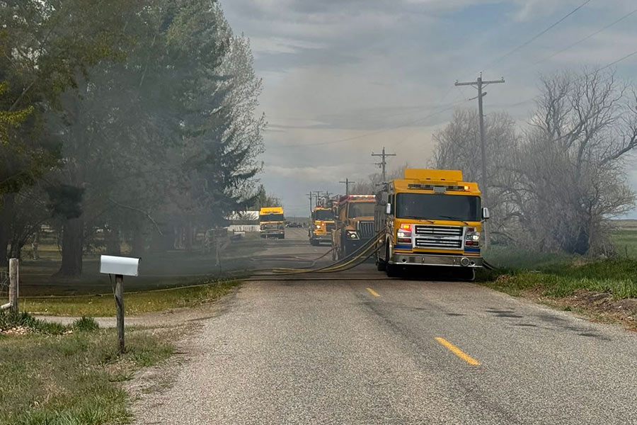 Madison County officials are working to extinguish a structure fire in Plano.