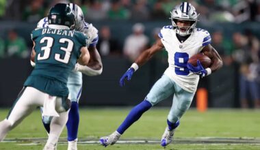 Dak Prescott carrying the football during a Dallas Cowboys game against the Jacksonville Jaguars. Focus on NFL football, Dallas Cowboys, and game action.