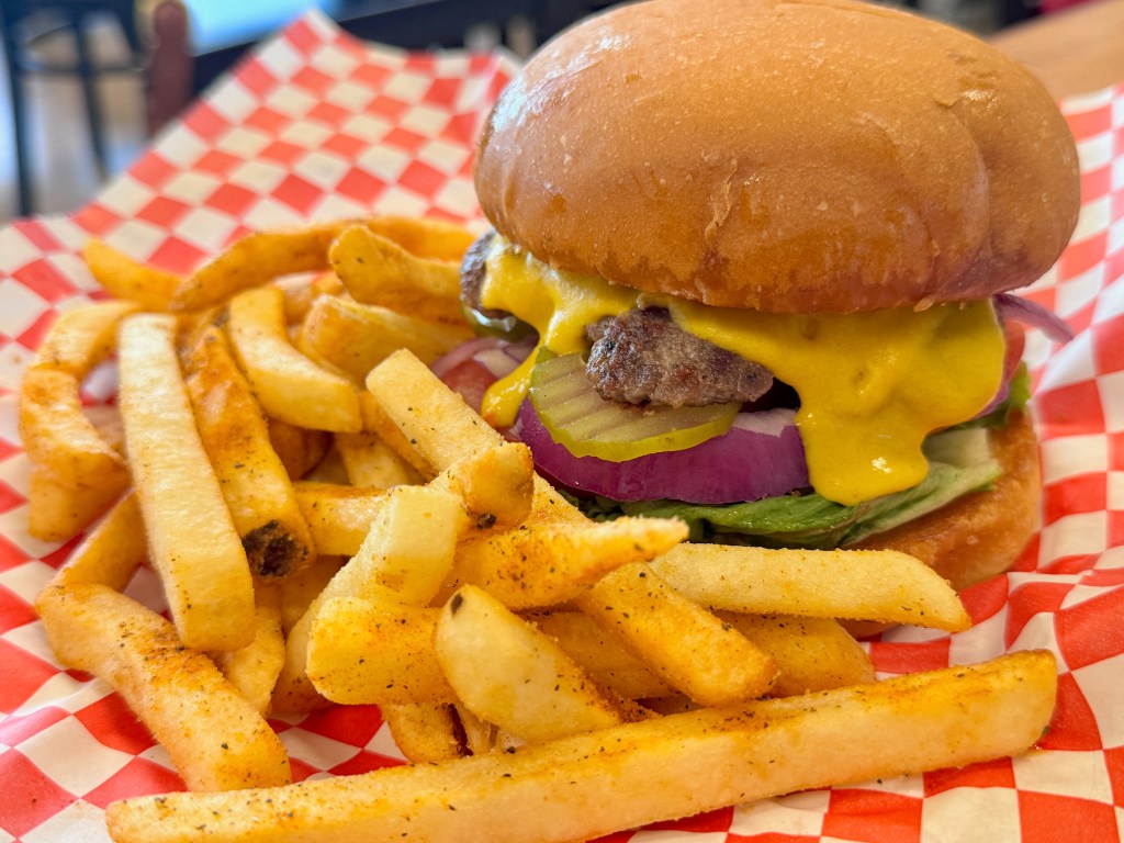 a burger and fries basket from smokey johns